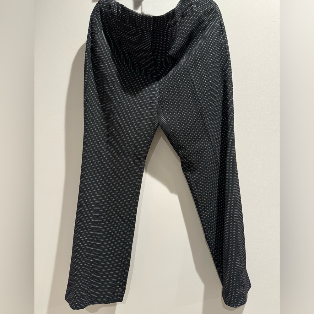 NWT Chico black with small white dots. Size 2